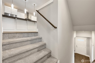Top of the landing going up to the beautiful kitchen and great room!