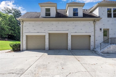 Garage featuring driveway