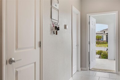 Entry Hallway with Extra Closet that Could be Closet or Pantry