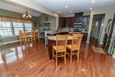 Upgraded Kitchen with Hardwood Floors, Vaulted Mor