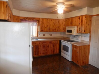 Fully equipped kitchen. Built in microwave, stove,