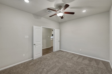 Office is located up front while primary bedroom i