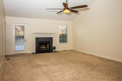 Living Room with vaulted ceiling and fireplace
