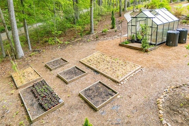 View of yard featuring an outdoor structure, an ex