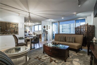 Open concept den and dining room area looking into