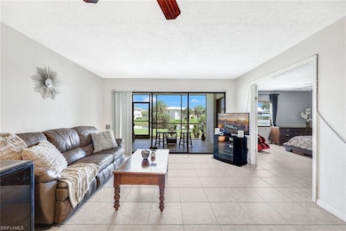 Kitchen featuring backsplash, appliances with stai