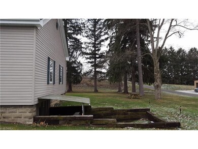 Mature trees and a half acre lot are nice features