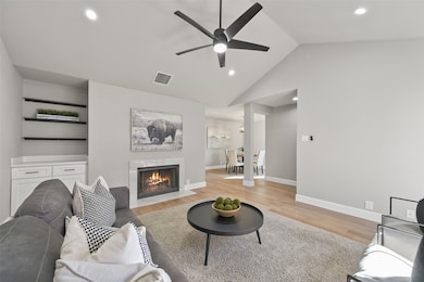 The front door delivers guests into this light & a