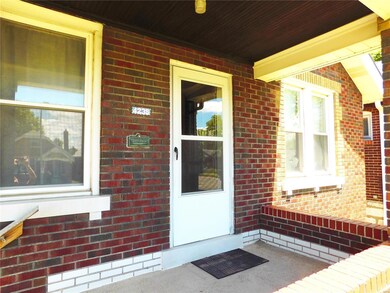 Nice covered porch to enjoy the St Louis weather.
