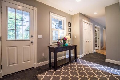 Mudroom area with built ins and half...