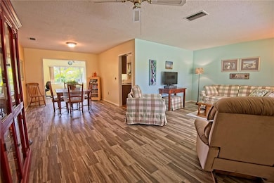 View from front door entry of living and dining ar