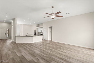 Great room with a view of the kitchen