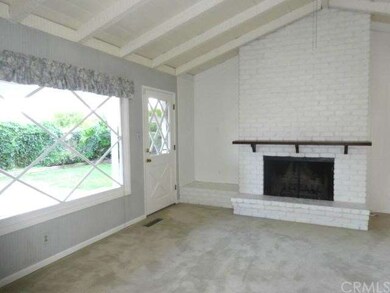 Very large family room with wood-burning fireplace
