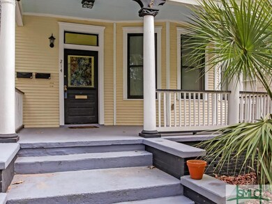 Deep front porch of this renovated duplex