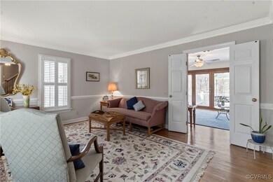 With built in plantation shutters, hardwood floors