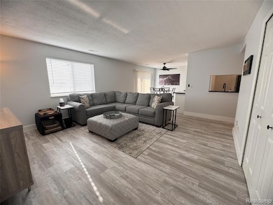 Large living room with coat closet