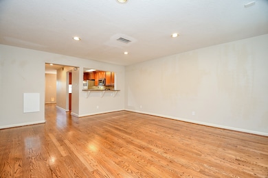 Spacious living area seamlessly connected to the k