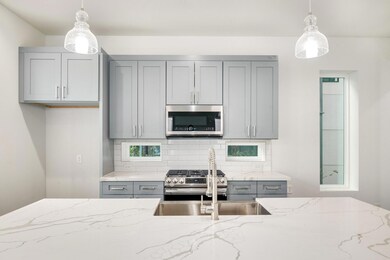 Kitchen featuring appliances with stainless steel 