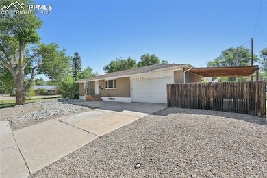 Ranch-style home with brick siding, concrete driveway, and a garage