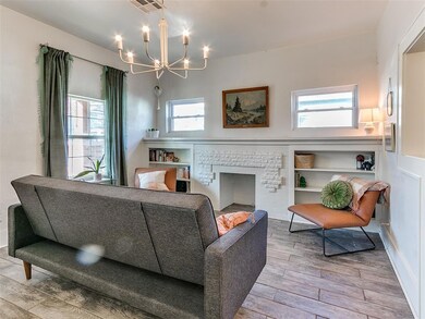 Living room with plenty of natural light, a notabl