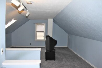 Master Bedroom with Skylight.