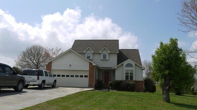 Partial brick and vinyl siding 3 bedroom 2.5 bath home 