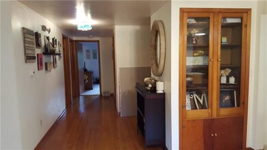 Looking from the living room down the wide hall.  