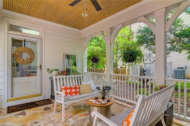 Breezeway adjoining garage and laundry/mudroom area off of kitchen.