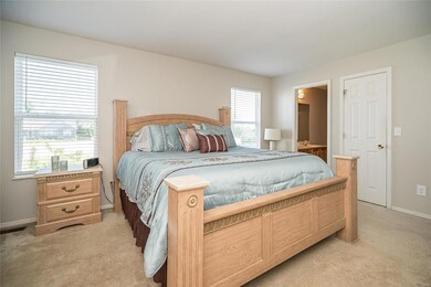 Owner's suite is roomy with attached full bath.