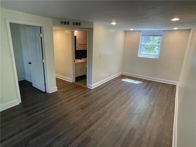 The living room runs as wide as the whole building enabling a flexible use of space (office / living room area for example).