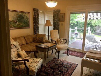 The family room/tv room opens to the brand new dec