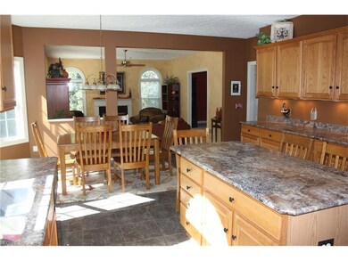 Kitchen opens to step down Family room