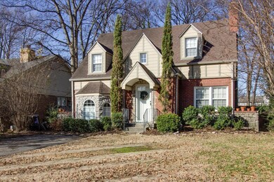 Beautiful landscaping featured in front of property.