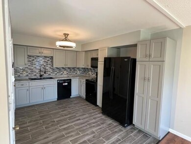 Kitchen including major appliances