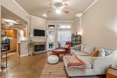 Spacious living area w cozy fireplace.