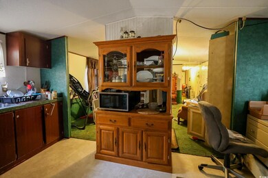 Office area with lofted ceiling
