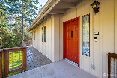 The darling front entryway with an approach from either side of the decking.