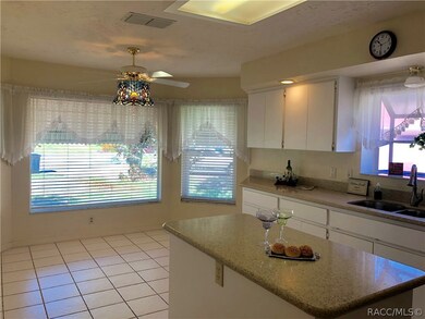 Kitchen & Island View to Eat In Kitchen Area