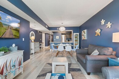 Living room featuring light hardwood / wood-style 