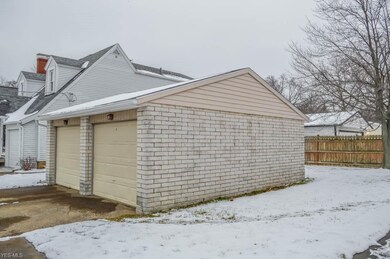 There's a detached garage with a space for each un