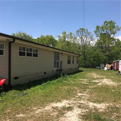 Spaciuos backyard behind home. Residence has level