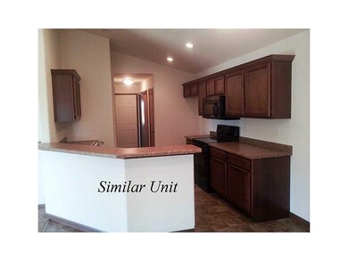 Kitchen. Picture is of Similar Unit.