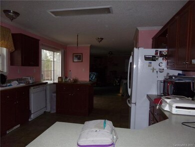 Kitchen looking towards den.