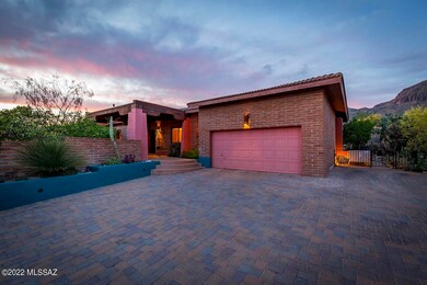 garage and beautiful paved driveway