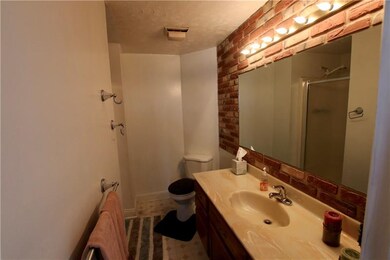 Full bathroom on the first level with large vanity