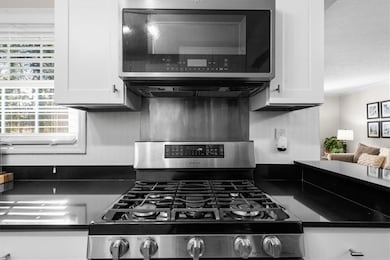 Kitchen featuring stainless steel appliances and w