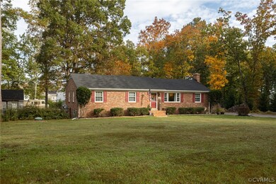 Great level lot with mature trees and paved drive