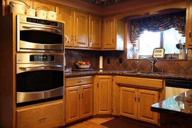 Stainless steel appliances included (Jenn Air range, convection oven, new dishwasher 2011).