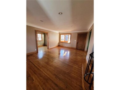 Front door with sun room on left