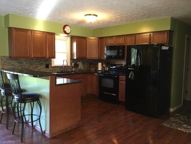 Kitchen with granite countertops.